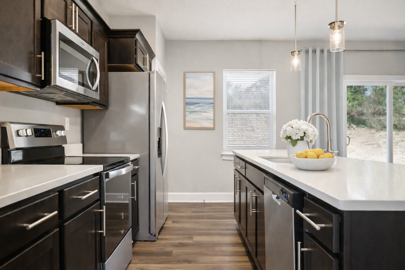 Modern kitchen with ocean artwork