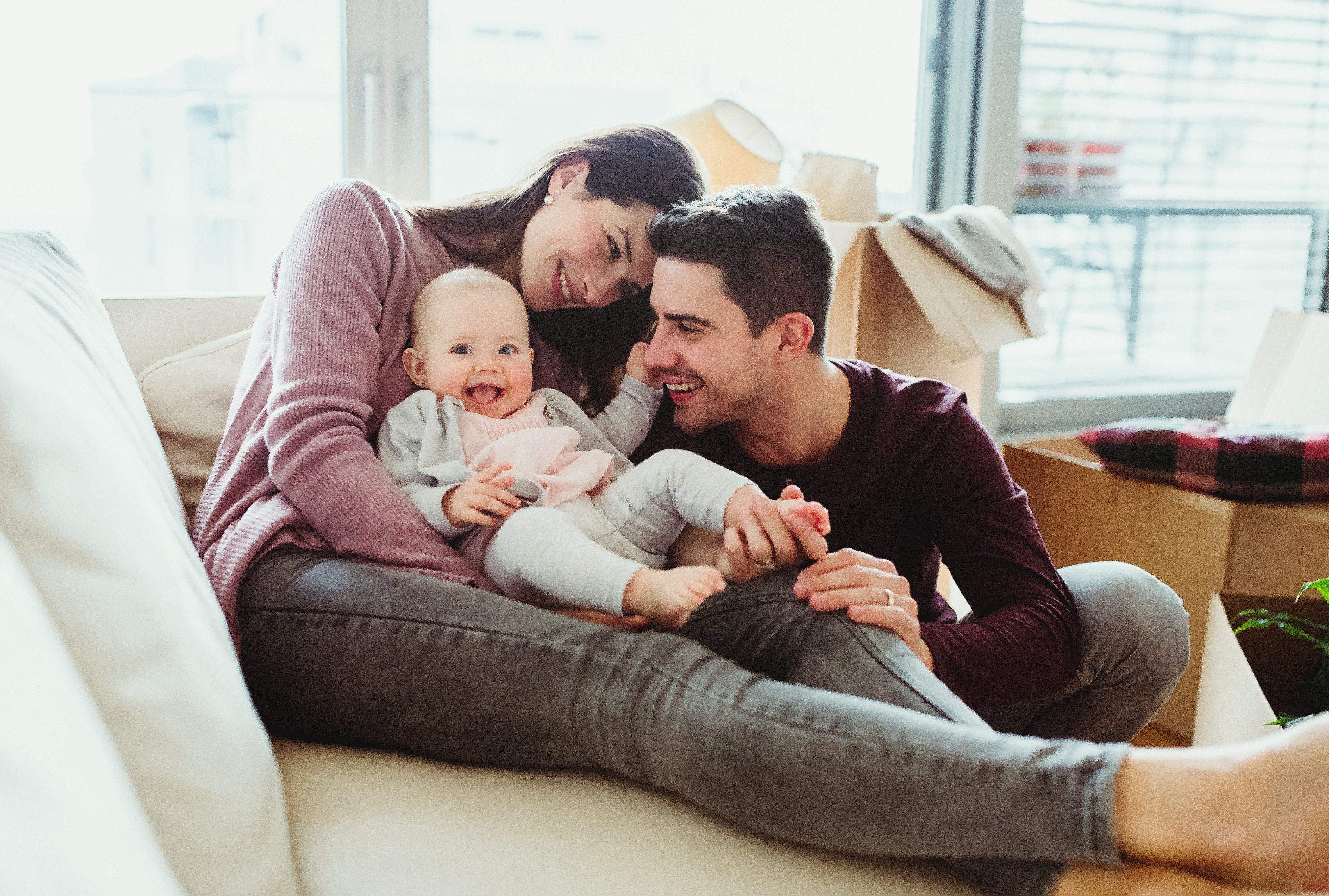 Young-Couple-With-Baby-Cardboard-Boxes