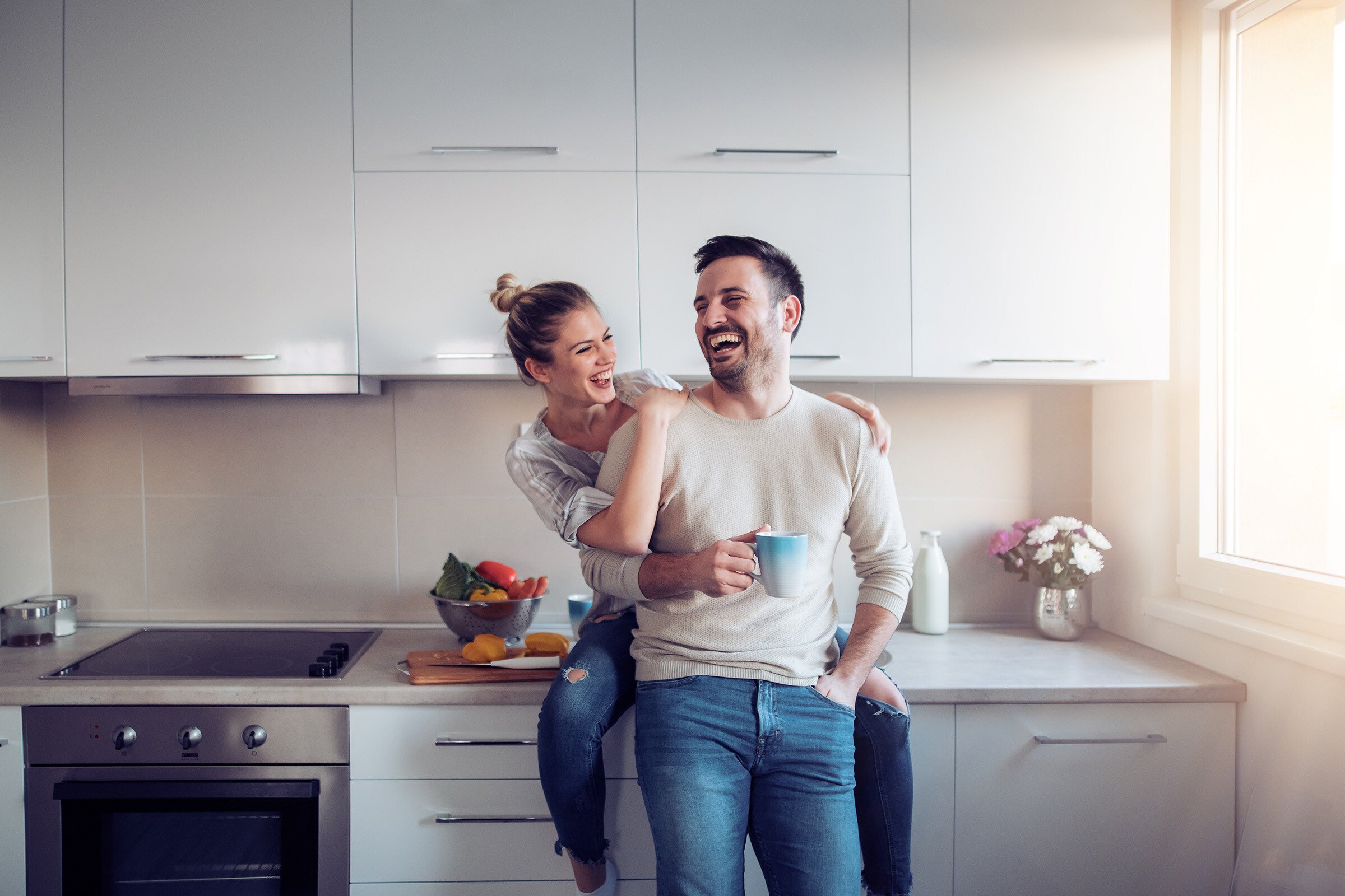 young couple in kitchen